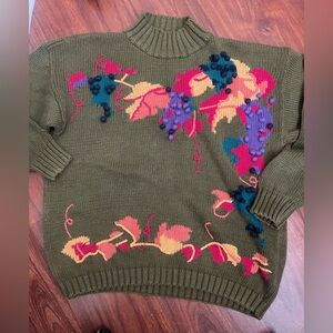 Liz Baker Olive Sweater with Vibrant fruit Accents